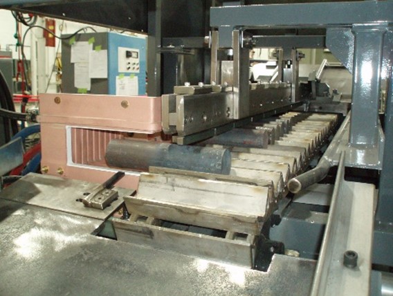 Automated bar-end heating prior to forging.