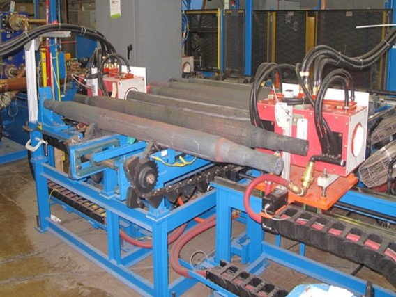 Walking beam induction heating system prior to forging